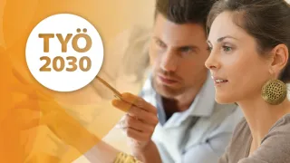 Nainen ja mies katselevat TYÖ2030-ohjelman logoa.